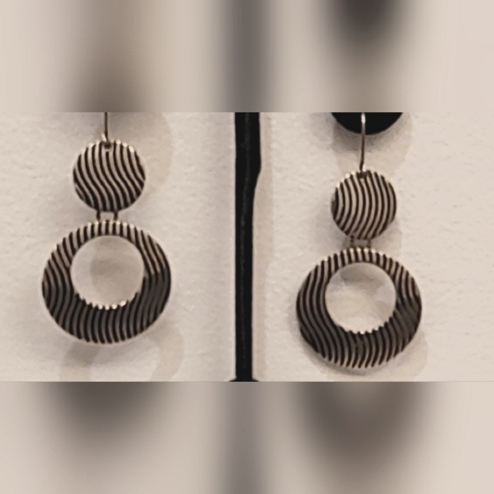 Silver dangle disc earrings